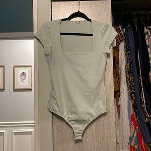 Free people sea-foam green body suit